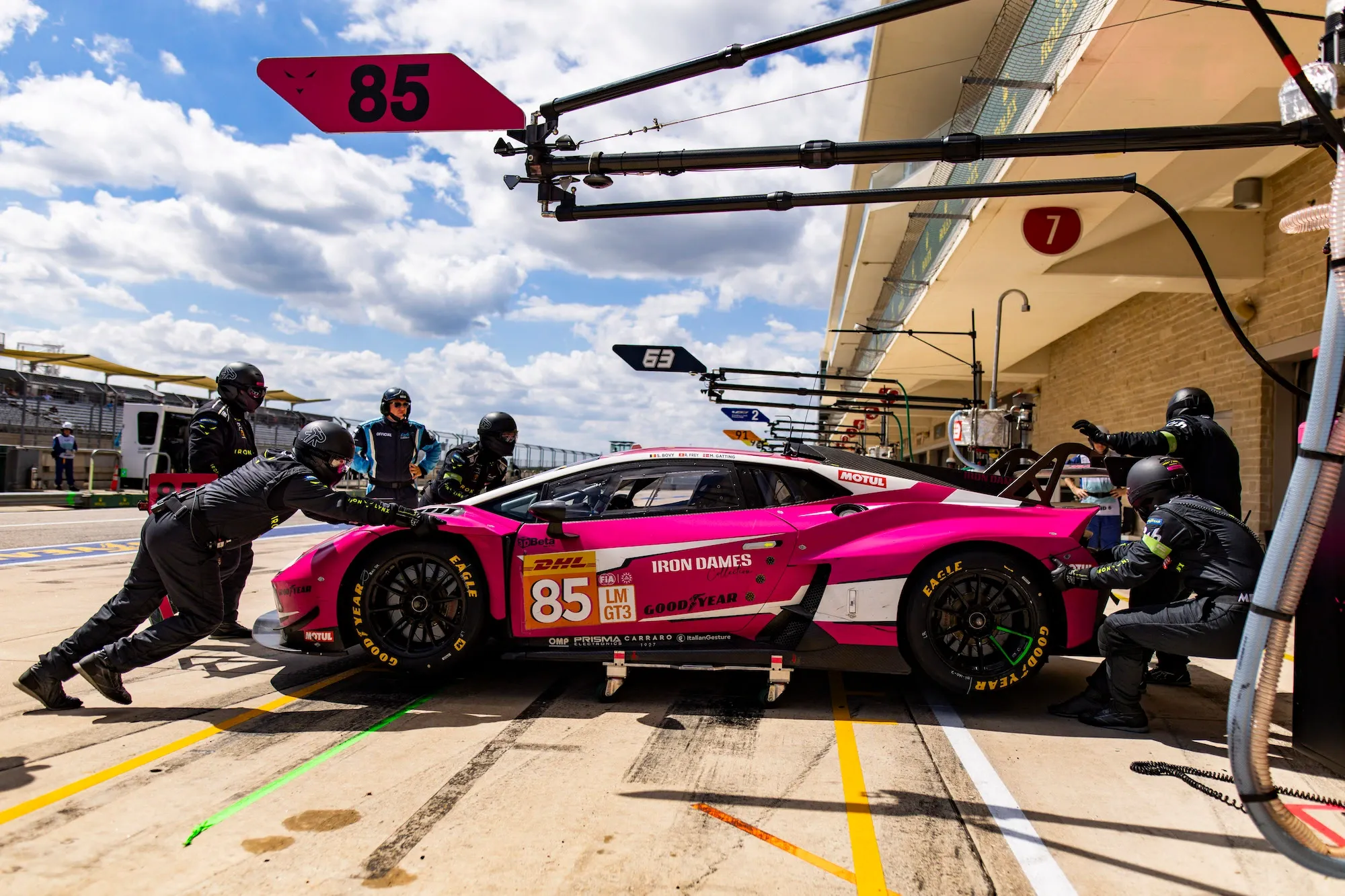 The Iron Dames Lamborghini being pushed back into the garage in COTA. Image: Julien Delfosse / DPPI